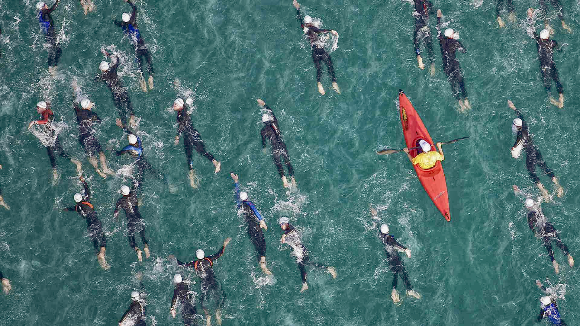 We work hard and smart, which means never alone, for you (iron man swimming)