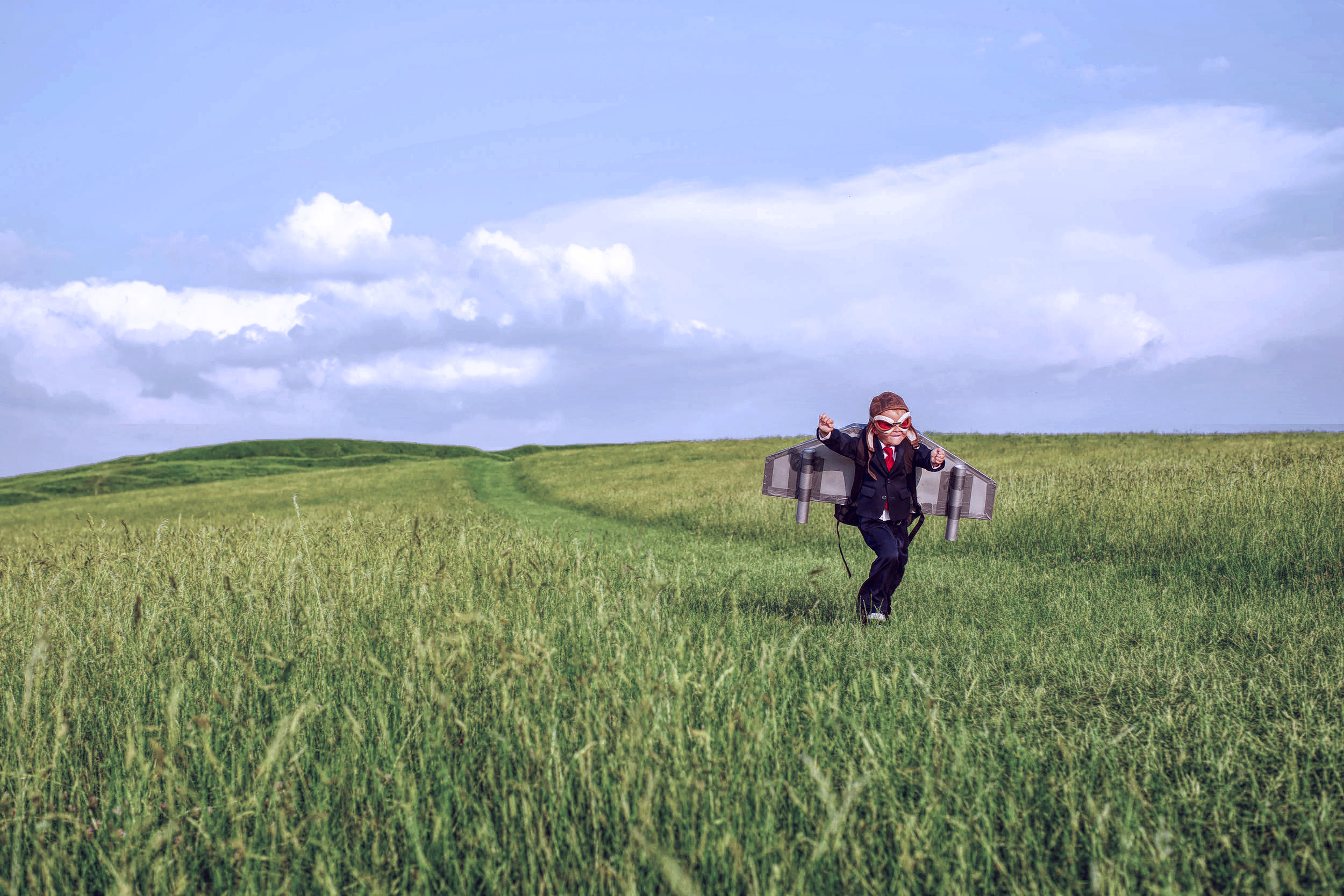 We are driven, motivated to inspire and cultivate the talent in people that each has in them (child dreaming of flying)